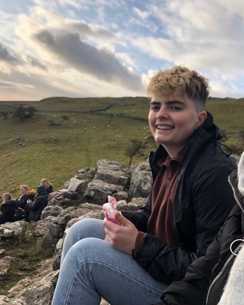 Eddy, a young campaigner, smiling